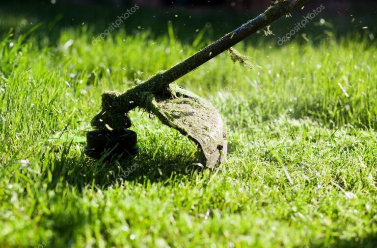 depositphotos_72674941-stock-photo-mowing-a-lawn-with-a